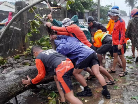 Typhoon blows off roofs, floods villages and displaces thousands in northern Philippines