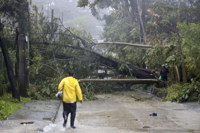 Taiwan shuts down schools and offices as Typhoon Doksuri scrapes the island's coast