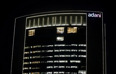 The logo of the Adani Group is seen on the facade of its Corporate House on the outskirts of Ahmedabad, India.(REUTERS)