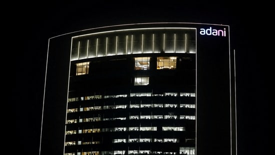 The logo of the Adani Group is seen on the facade of its Corporate House on the outskirts of Ahmedabad, India.(REUTERS)