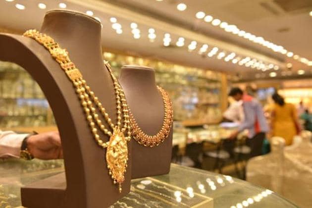 According to jewellers, the introduction of GST at 3% on gold and 18% on making charges has led to a hike in gold jewellery price.(HT File Photo)