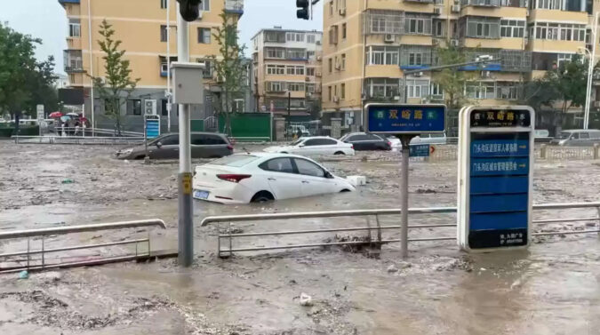 Storm Doksuri: Beijing on alert with two killed as heavy rain batters north China