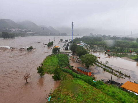 Flooded rivers, cities test China's disaster response systems