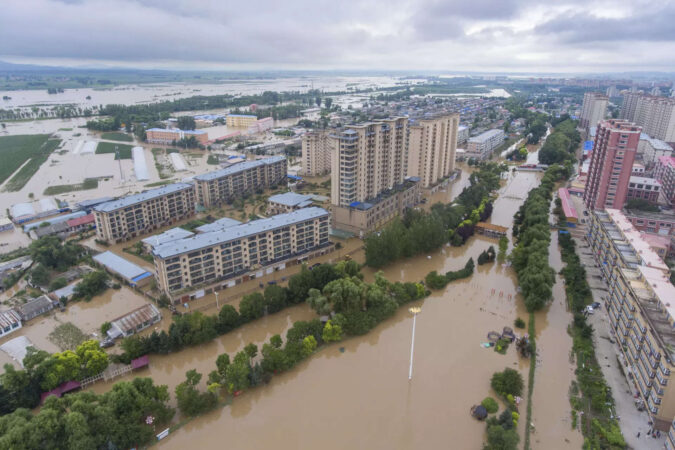 China raises emergency response level for floods in northeast