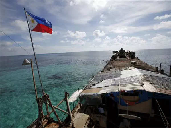 Manila will 'never abandon' Philippine-held shoal in South China Sea