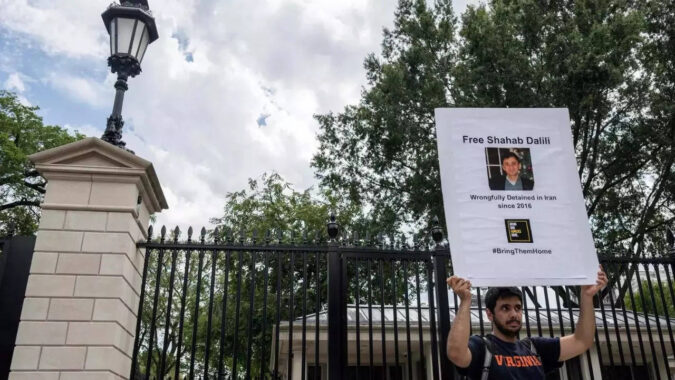 Father, son on hunger strike in Iran prison, outside White House