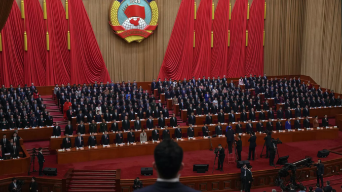 China passes law granting Communist Party more control over cabinet