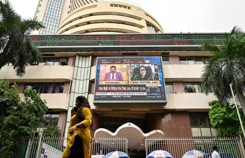 A pedestrian walks past the Bombay Stock Exchange (BSE) building during the presentation of budget, in Mumbai, India, on Tuesday, July 23, 2024 (Anshuman Poyrekar/ Hindustan Times)