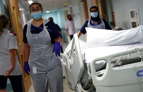 UK hospital cyber attack: Medical staff transfer a patient along a corridor at the Royal Blackburn Teaching Hospital in Blackburn, north-west England.(AFP)