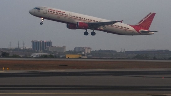 An Air India aircraft takes off at Kempegowda International Airport in Bengaluru on April 12, 2024.(AFP)