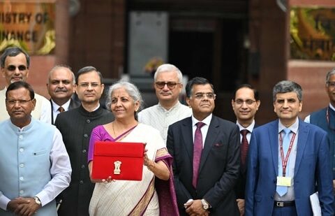 Finance minister Nirmala Sitharaman poses for photos before her budget speech. (AFP)