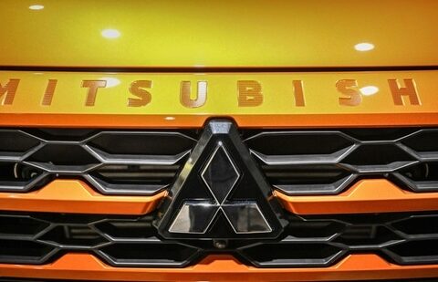 The emblem of Japanese automaker Mitsubishi Motor is seen at a showroom in Tokyo on May 9, 2024. (Yuichi YAMAZAKI / AFP)(AFP)