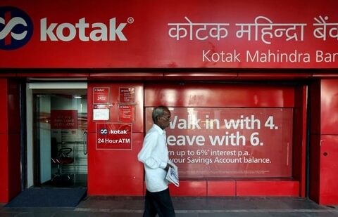 A man walks past the Kotak Mahindra Bank branch in New Delhi, India, September 6, 2017. (Adnan Abidi/Reuters)