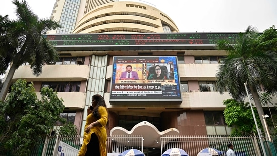 A pedestrian walks past the Bombay Stock Exchange (BSE) building during the presentation of budget, in Mumbai, India, on Tuesday, July 23, 2024. (Anshuman Poyrekar/ Hindustan Times)