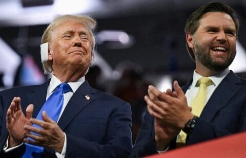 Republican presidential nominee and former US President Donald Trump (left) and Republican vice-presidential nominee JD Vance applaud on Day 2 of the Republican National Convention, in Milwaukee, Wisconsin, on Tuesday. (Reuters)