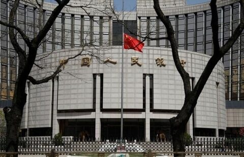 The Chinese national flag flies at half-mast at the headquarters of the People’s Bank of China, the central bank (PBOC), as China holds a national mourning. National flags were lowered to half-mast across the country, including in the capital’s Tiananmen Square. (Carlos Garcia Rawlins / REUTERS)