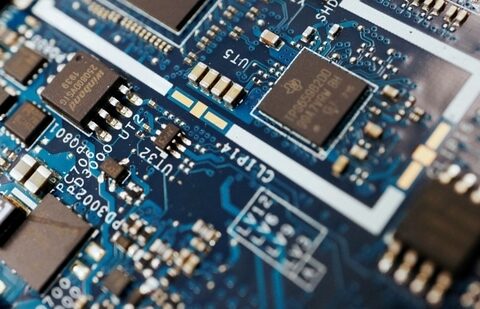 Latest news on August 4, 2024: Semiconductor chips are seen on a circuit board of a computer in this illustration picture taken February 25, 2022. (Florence Lo/Reuters)