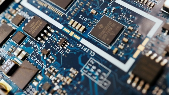 Latest news on August 4, 2024: Semiconductor chips are seen on a circuit board of a computer in this illustration picture taken February 25, 2022. (Florence Lo/Reuters)