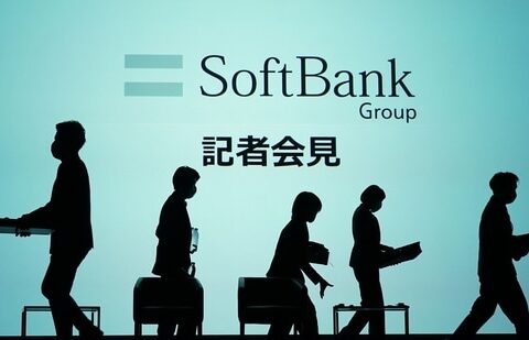 Workers on the stage as they prepare for a SoftBank Group Corp. news conference in Tokyo, Japan.(Bloomberg)