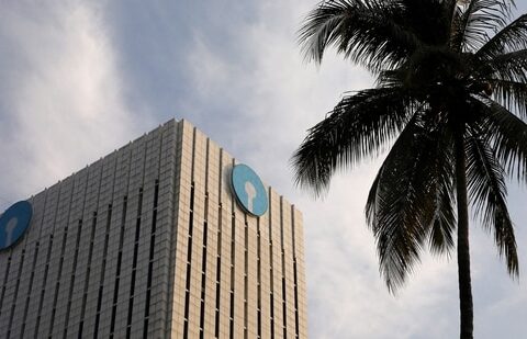 The logo of State Bank of India (SBI) is seen on the facade of its headquarters in Mumbai, India.(Reuters)