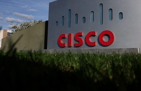 Cisco layoffs: The Cisco logo is displayed in front of Cisco headquarters in San Jose, California.(AFP)