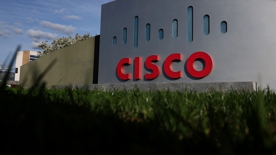 Cisco layoffs: The Cisco logo is displayed in front of Cisco headquarters in San Jose, California.(AFP)