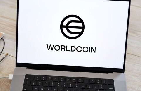 The Worldcoin logo on a laptop arranged in Germantown, New York, US, on Monday, July 24, 2023. Worldcoin, the digital identity and crypto payments project was co-founded by OpenAI Chief Executive Officer Sam Altman (Gabby Jones/Bloomberg)(Bloomberg)