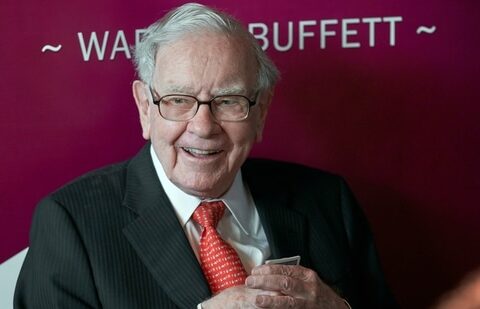 Warren Buffett, chairman and CEO of Berkshire Hathaway, smiles as he plays bridge following the annual Berkshire Hathaway shareholders meeting in Omaha.(AP)