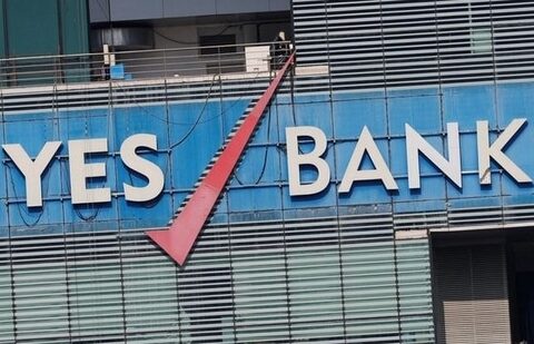 The logo of Yes Bank is pictured on the facade of its headquarters in Mumbai.(Reuters)