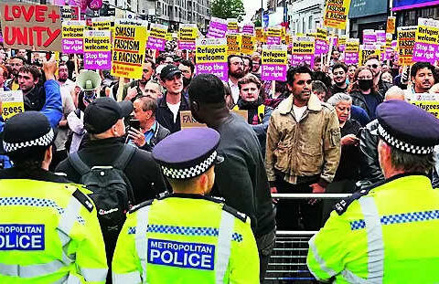 UK riots halted by communities, police but country remains on alert