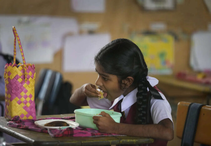 India's high food inflation leaves less in lunch boxes of poor school children