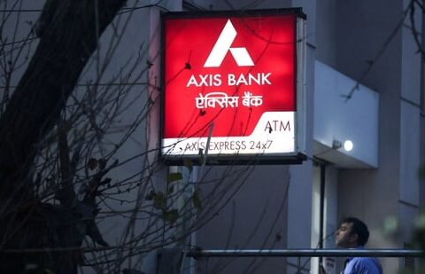A man enters a branch of Axis Bank in New Delhi, India. (Reuters)