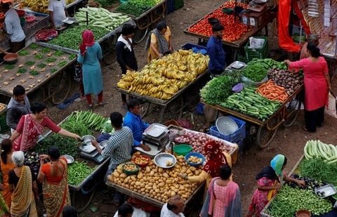 the above-normal monsoon this year has boosted agricultural output and helped drive down food prices and, therefore, India's inflation rate. (Reuters)