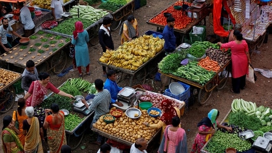 the above-normal monsoon this year has boosted agricultural output and helped drive down food prices and, therefore, India's inflation rate. (Reuters)