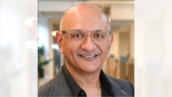 This Indian-American executive at a $270 billion company once worked as a waiter to survive