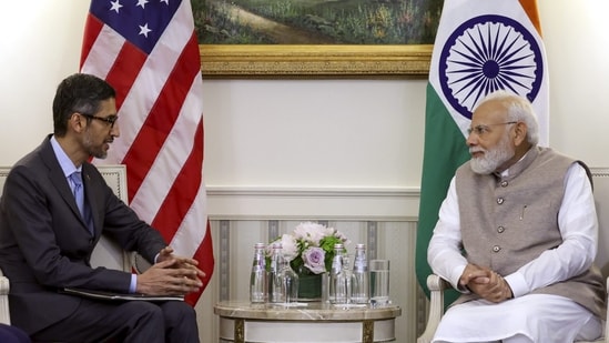 Prime Minister Narendra Modi with the CEO of Google and Alphabet Sundar Pichai during a meeting, at White House. (PTI)