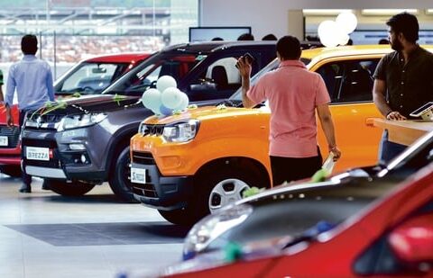 File photo of Maruti Suzuki cars inside a showroom. (HT)