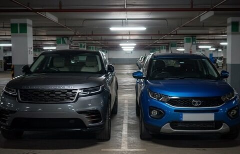 What explains the crash in TMPV share price after first earnings since demerger| Business News A Range Rover and Tata Nexon in an underground parking lot. (AI Image)