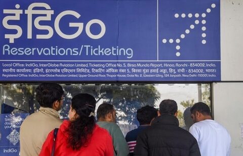How India’s largest airline unraveled in quest for higher profit| Business News Passengers inquire at an IndiGo airlines counter amid flight disruptions at Birsa Munda Airport in Ranchi on Sunday (7 December 2025). The sight of one carrier bringing national air traffic to a near-halt underscores the danger of India’s reliance on too-big-to-falter industrial giants. (PTI)