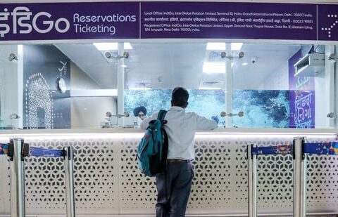 IndiGo told to cut flights amid cancellations. What does that mean for the passenger?| Business News A sign of things to come? A lone passenger stands at a IndiGo ticket counter at Indira Gandhi International Airport in New Delhi on Tuesday (9 December 2025). (ANI)