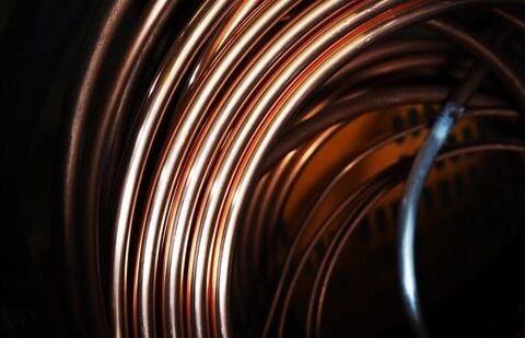 Copper prices hit a record just below $13,000 a tonne in an end-of-year surge, before paring gains. (Unsplash)