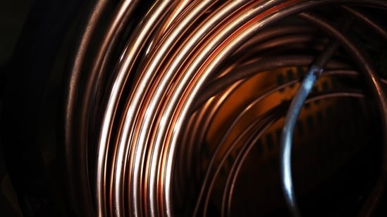 Copper racks up longest rally since 2017 with bulls at the helm| Business News Copper prices hit a record just below $13,000 a tonne in an end-of-year surge, before paring gains. (Unsplash)