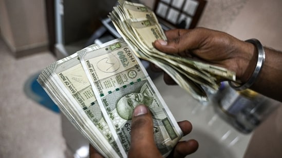 The rupee weakened to 90.42 against the U.S. dollar, eclipsing its previous all-time low of 90.29 hit on Wednesday. (Bloomberg)