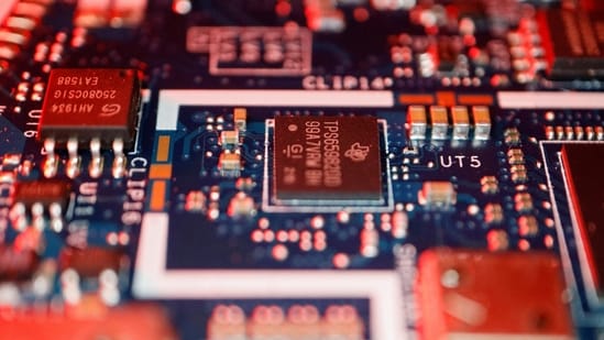 Semiconductor chips are seen on a circuit board of a computer in this representational image. RRP Semiconductor has rejected rumours about its supposed links to cricketer Sachin Tendulkar and to state-allotted land for chipmaking. (Reuters)