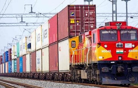 A freight train carrying cargo containers rides along a railway track in Ajmer on August 26 (AFP FILE)