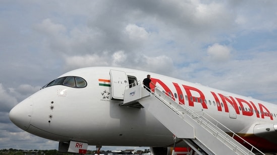 FILE PHOTO: Branding for Air India is seen on an Airbus A350-900 at the Farnborough International Airshow, in Farnborough, Britain, July 24, 2024. REUTERS/Toby Melville/File Photo (REUTERS)