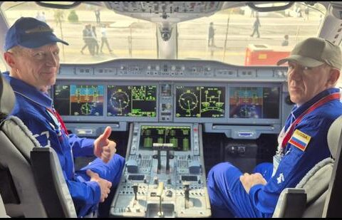 Russian pilots inside the SJ-100 cockpit at Wings India 2026 in Hyderabad