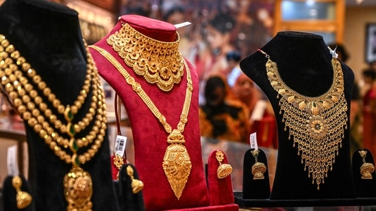 Higher gold prices have historically spurred Indians to sell jewellery and coins, but that hasn't been the case for the year or so. (AFP)