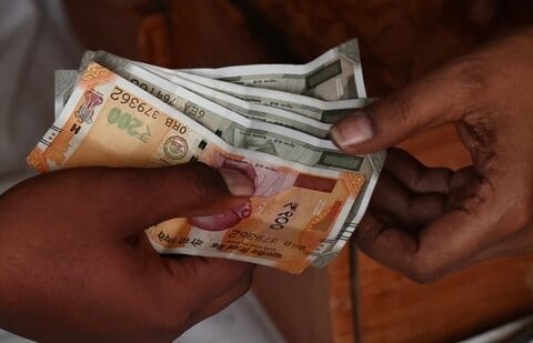 The inclusion of Government bonds into global bond indices, higher yields, sovereign credit rating upgrades, etc., are attracting foreign investors into the bond market. (AFP)