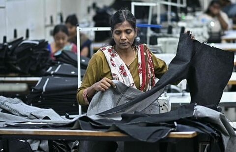 A woman working at a textile unit in India (HT_PRINT)